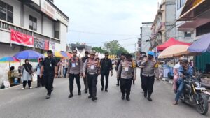Naik Motor, Dirlantas Polda Riau Jadi Sosok di Balik Lancarnya Pacu Jalur Kuansing 2025