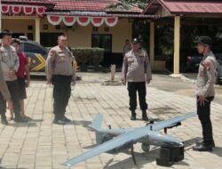 Polres Kuansing Berkerjasama dengan Polda Riau Pantau Aktivitas PETI lewat udara Menggunakan Drone