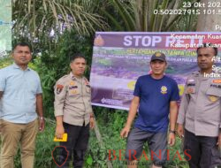Polres Kuantan Singingi Gencarkan Pemasangan Spanduk “Stop PETI” di Sepanjang Sungai Kuantan