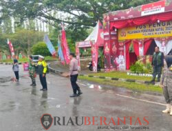 Diguyur Hujan, 4 Pos Pam Nataru Polres Kuansing Tetap Berikan Pelayanan Terbaik