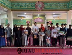 Jumat Berkah, Bapenda Pekanbaru Bantu Perlengkapan Sekolah untuk Anak Yatim
