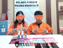 Digerebek Tengah Malam! Sepasang Pengedar Sabu dan Ekstasi Dibekuk Polsek Pinggir, Puluhan Paket Narkoba Disita