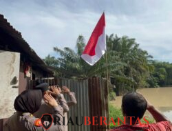 Semarak HUT RI ke-81, Polsek Limapuluh Turun ke Gang-gang Pasang Bendera Lewat Ekspedisi Merah Putih