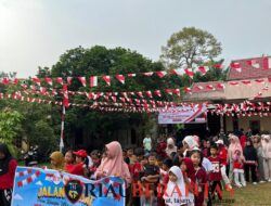 Semarak Kemerdekaan, Gerak Jalan Sehat RT 08/RW 03 Desa Buluh Rampai Digelar Bersama KKN 143 UMRI