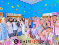 Mahasiswa KKN 102 UMRI melakukan kegiatan Pojok Baca di SDN 009 Desa Talau